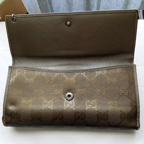 Authentic Gucci Metallic brown Signature wallet with GG charm - Picture 16 of 16